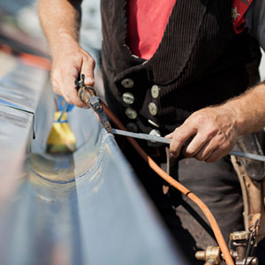 Rain gutters getting cleaned